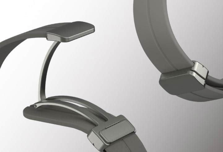 Снимок крупным планом серого спортивного ремешка Galaxy Watch5 Pro с D-пряжкой открывается, подчеркивая D-образную пряжку магнитного типа.